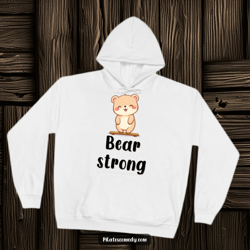 Funny hoodie featuring a happy bear in a plank pose with a smile, offering warmth and a touch of fitness humor.