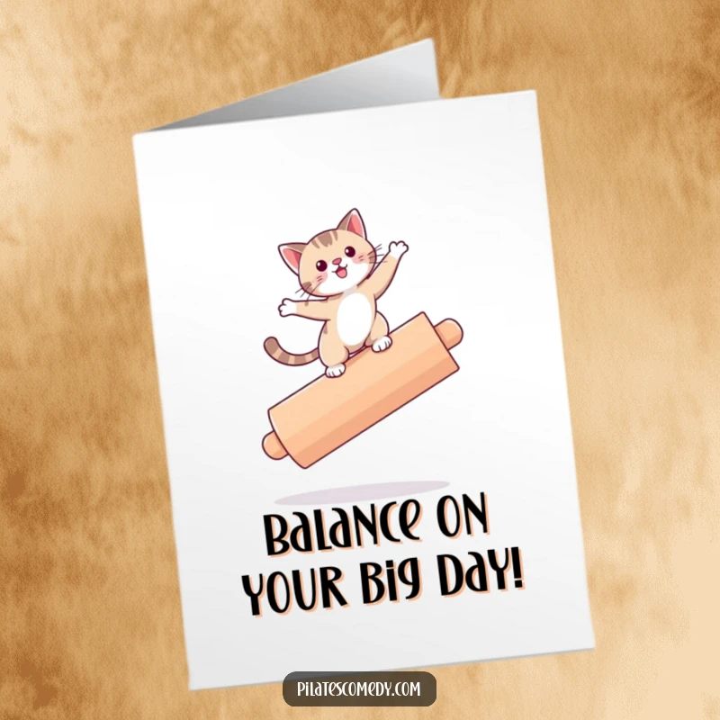 Funny free printable birthday card featuring a playful cat precariously balancing on a large roller.