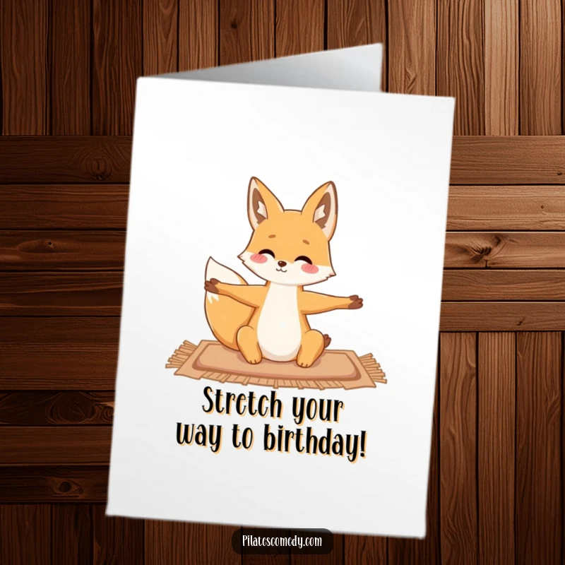 Funny free printable birthday card featuring a graceful fox stretching its limbs on a mat.